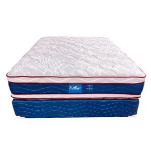 Two-toned mattress set: a white patterned top mattress on a blue base, with a blue center label visible.
