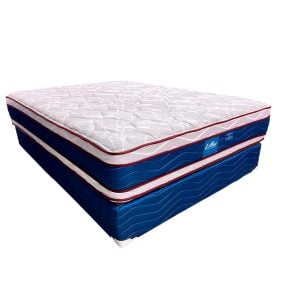 Three-layer mattress set with a white quilted top and blue sides, stacked on a blue foundation.