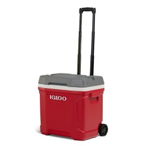 Red Igloo cooler with a grey lid and telescoping handle on wheels for easy transport.